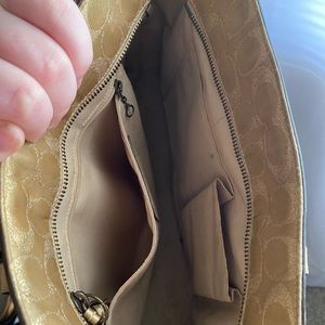 Gold coach purse
